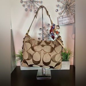Coach Carly signature large bag with gold and Leather hardware straps